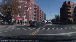 Garmin Dash Cam™ Picture Although set up on oct 16, 2015, the evening after my loved one's hospitalization as of Oct 20, 2015 when I spoke with the Light Inspector at the corner; he admitted they two arrows should be green and that they likely will be programmed GREEN, SOON. What is the delay? Why are the arrows which point down the block where the effigy is hanging on Oct 20, 2015, NOT programmed green YET? They seem to be waiting for something.